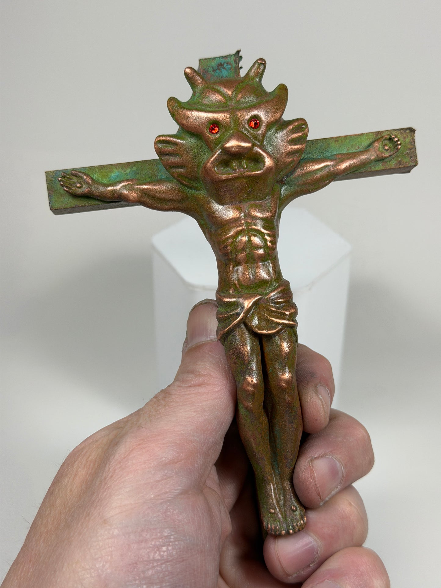 Christ on the Cross but he is Aton: Copper Plated Space Lord