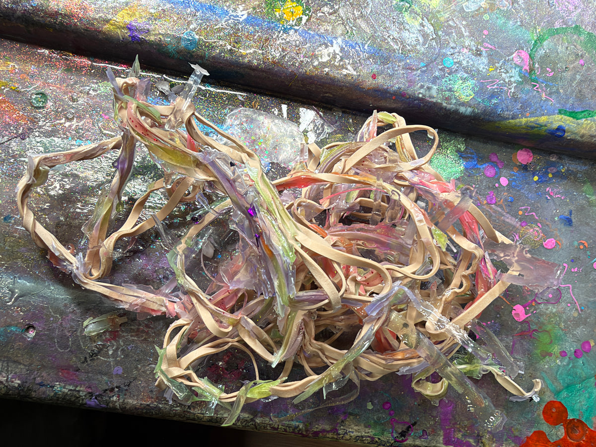 Ape: Used Rubber Band Pile