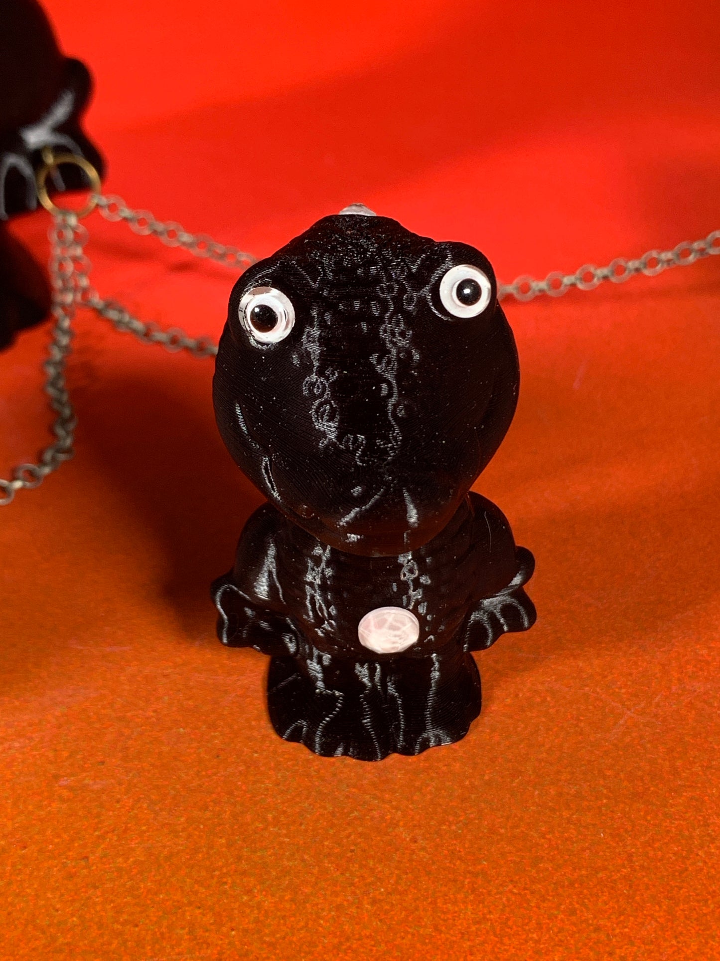 Shiny Black Crocodile Chained to 6 Small Crocodiles