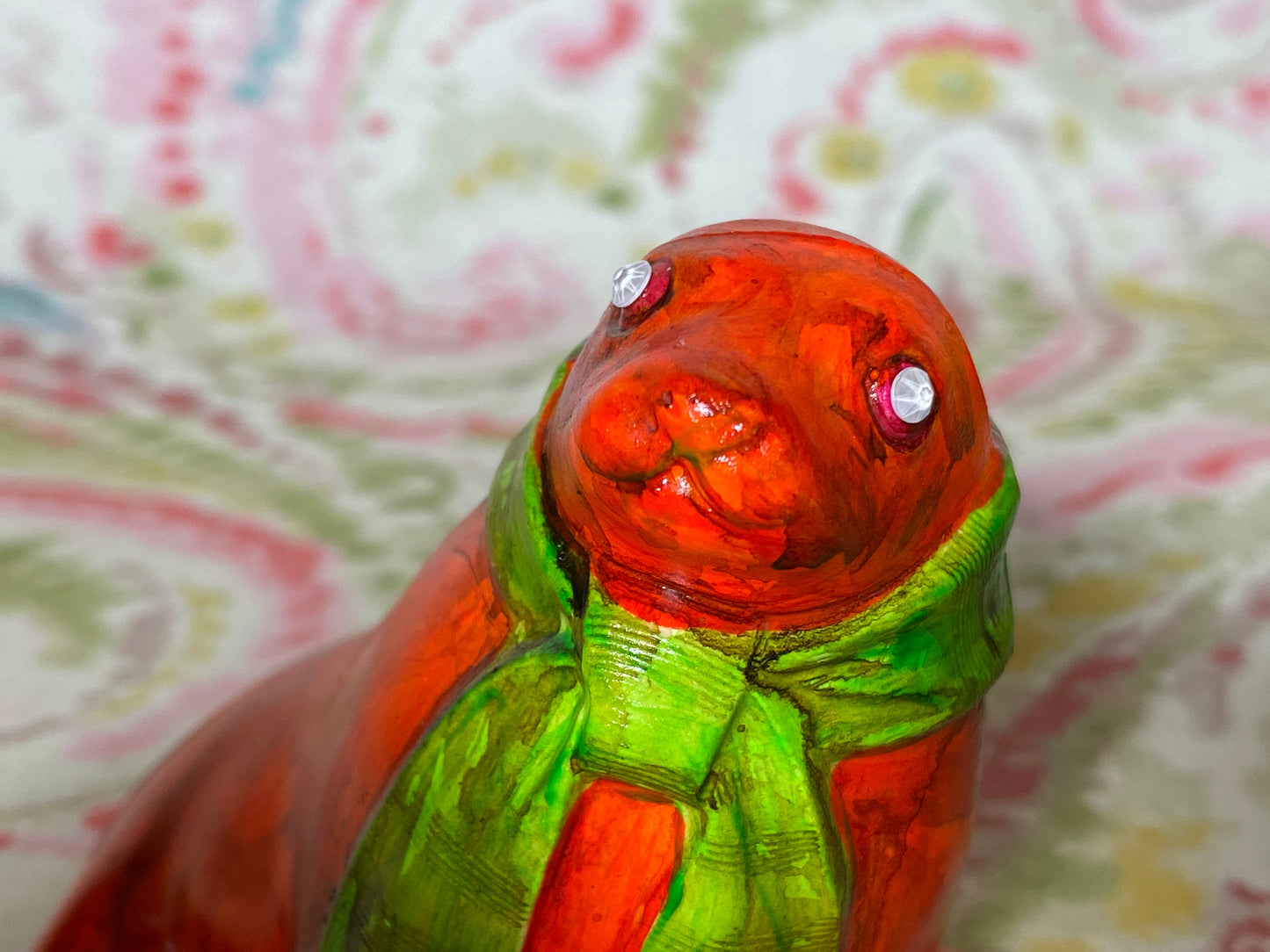 Orange Seal with Green Scarf