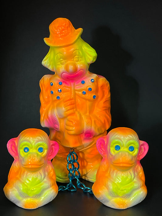 Clown with Monkeys: The Neon Whisper