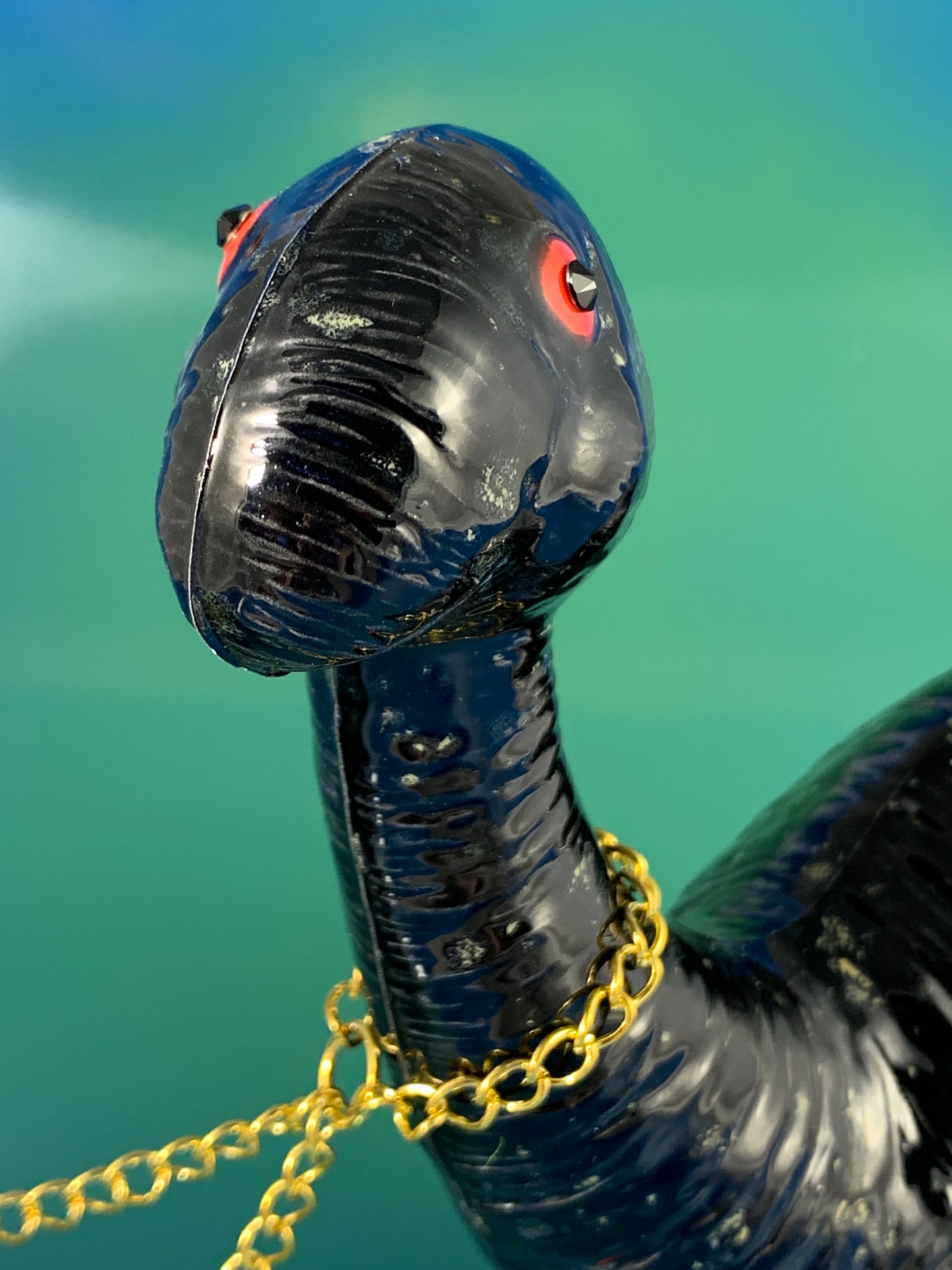 Black Dino Chained to Black Cats