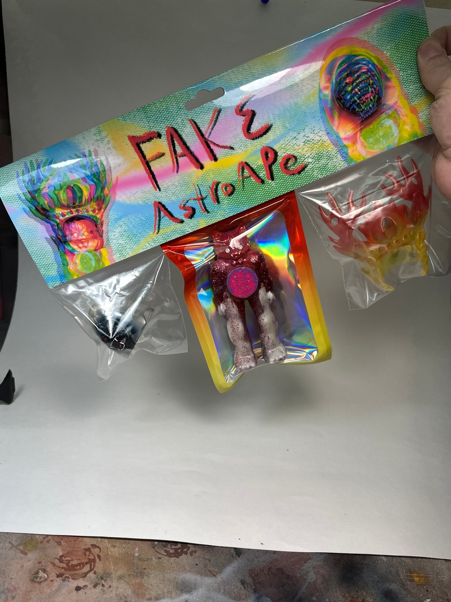 FAKE AstroApe: Glow in the Dark Red Glitter/White