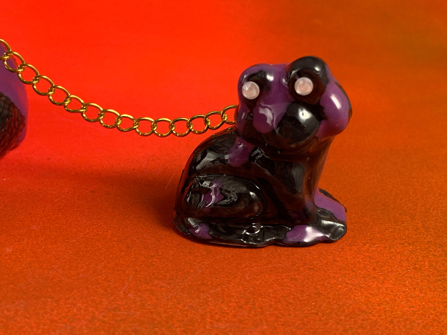 Two Frogs Chained to a Rattlesnake