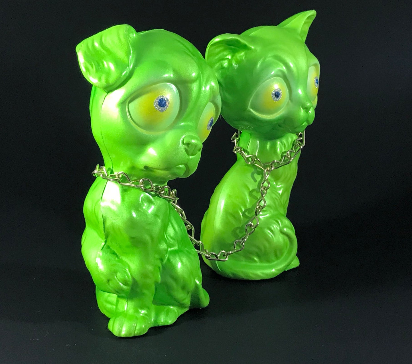 Chained sad dog and sad cat, iridescent green with metal flake/glitter eyes