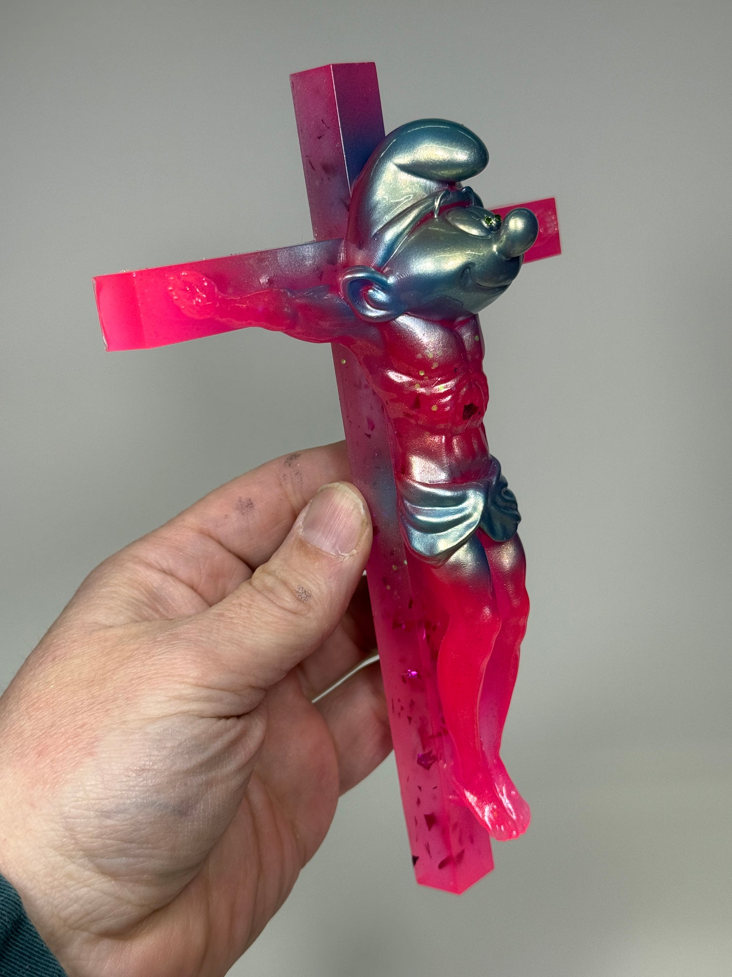 Christ on the Cross but he is a Smurf: Glow Pink