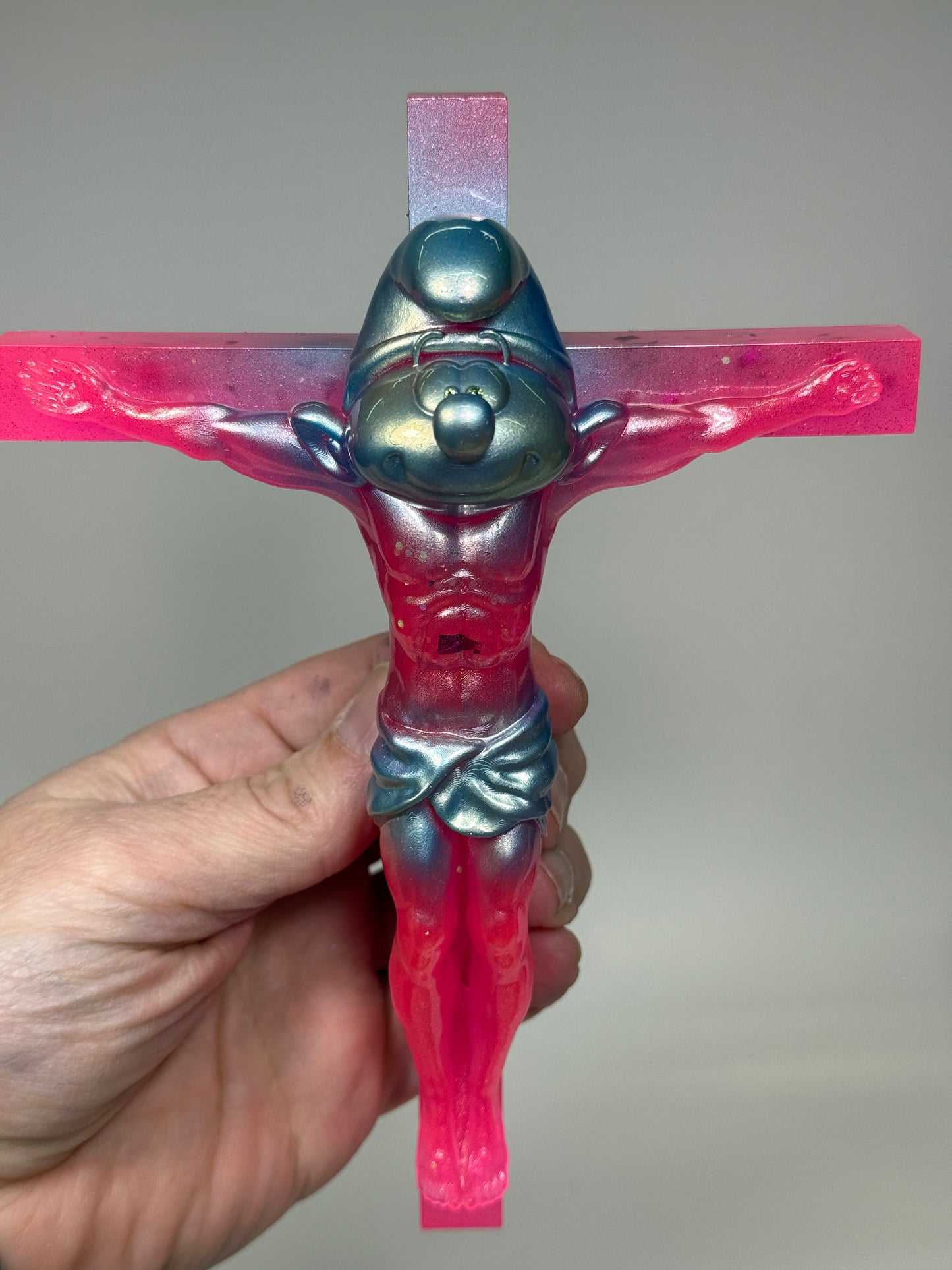 Christ on the Cross but he is a Smurf: Glow Pink