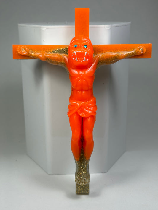 Christ on the Cross but he is an Ape, Magical Toy: Golden Cross of Glory