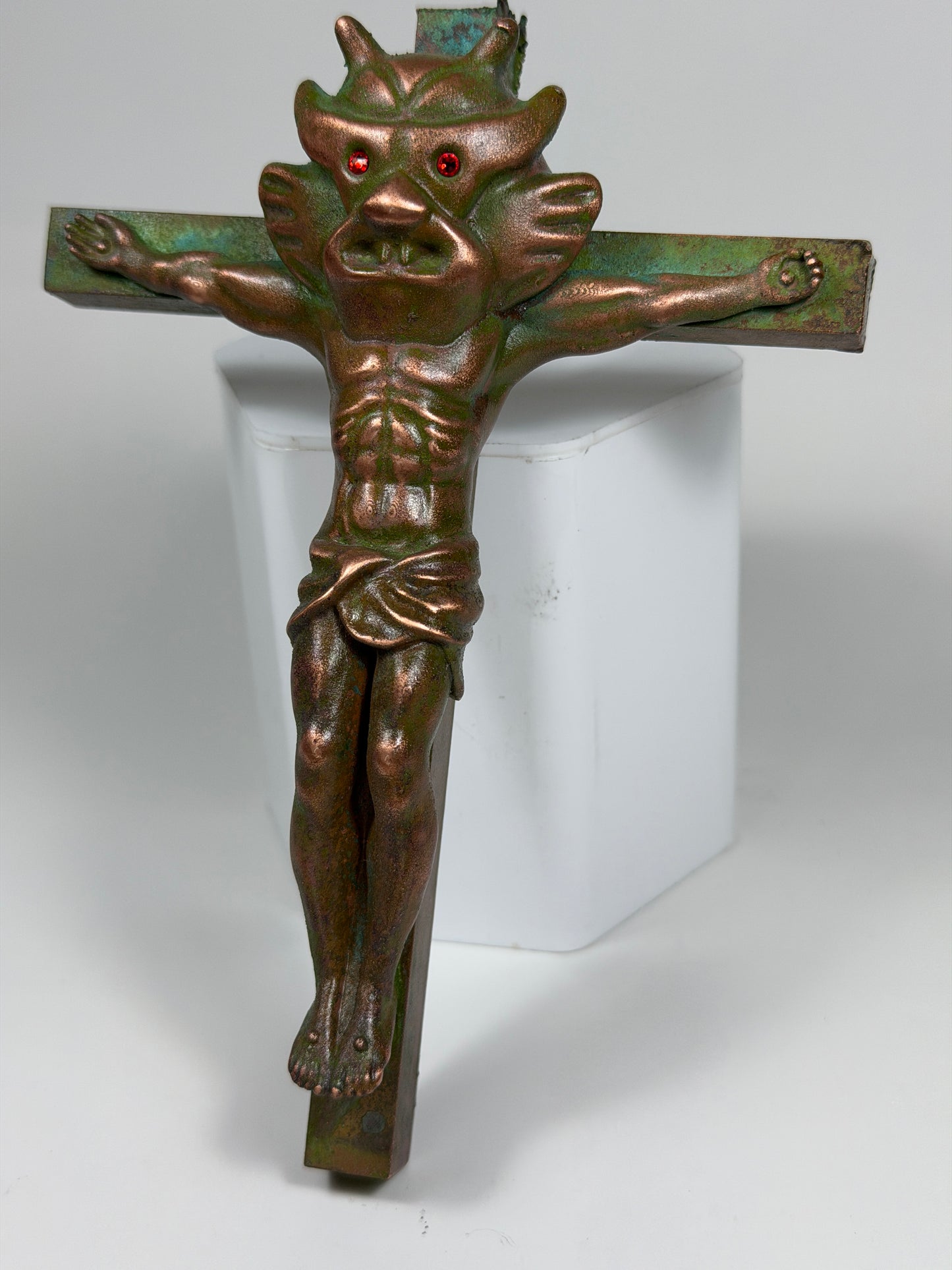 Christ on the Cross but he is Aton: Copper Plated Space Lord