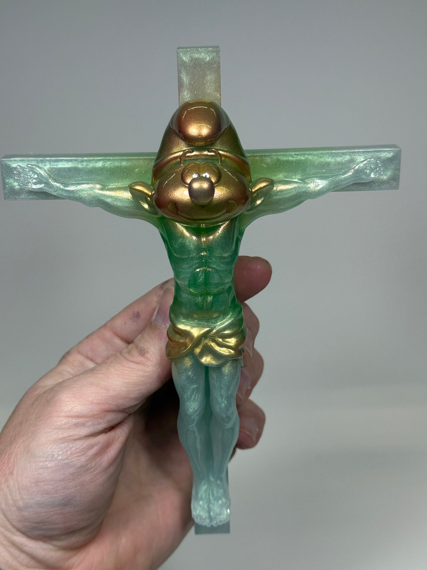 Christ on the Cross but he is a Smurf: Misty Green