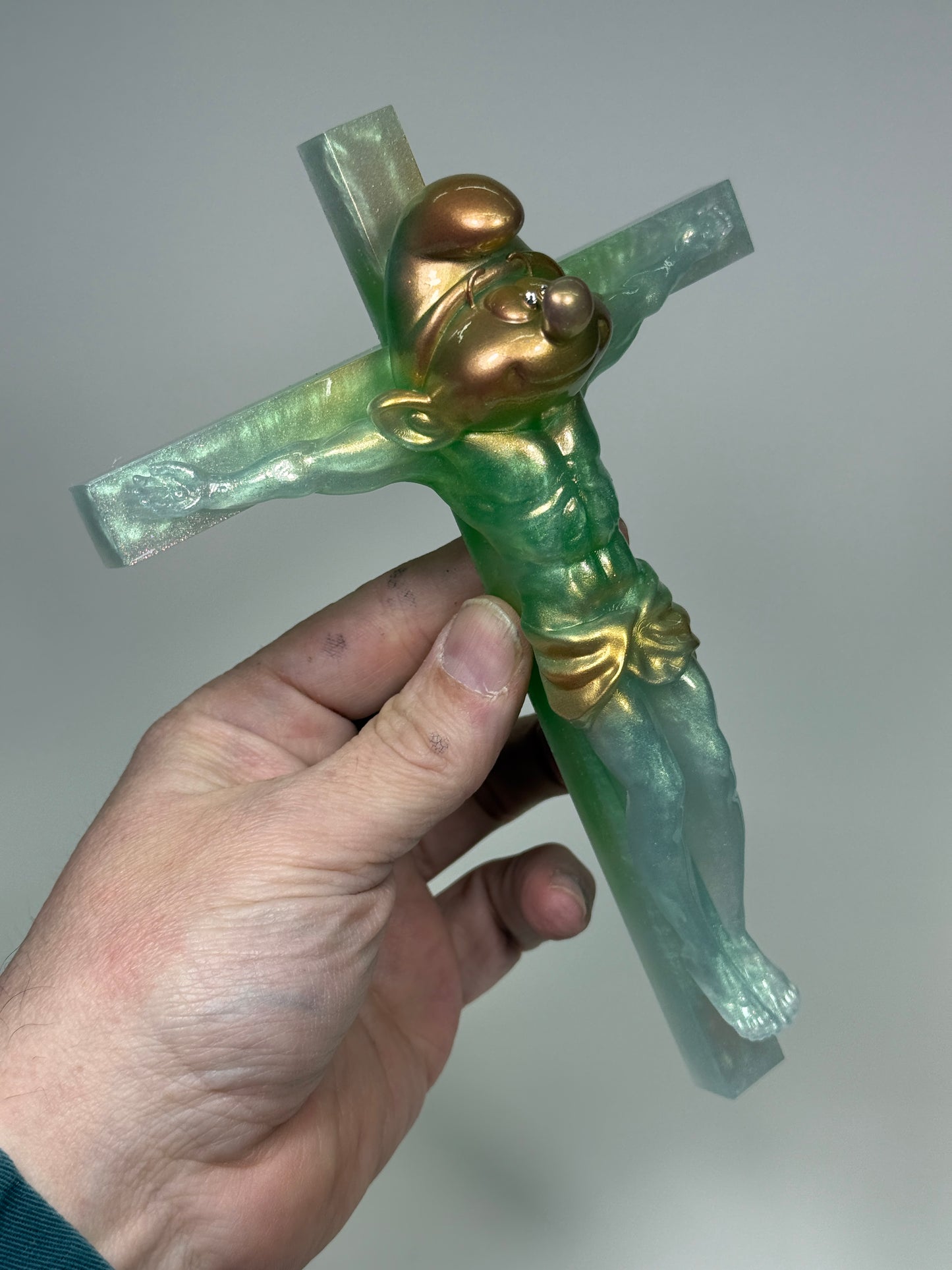 Christ on the Cross but he is a Smurf: Misty Green