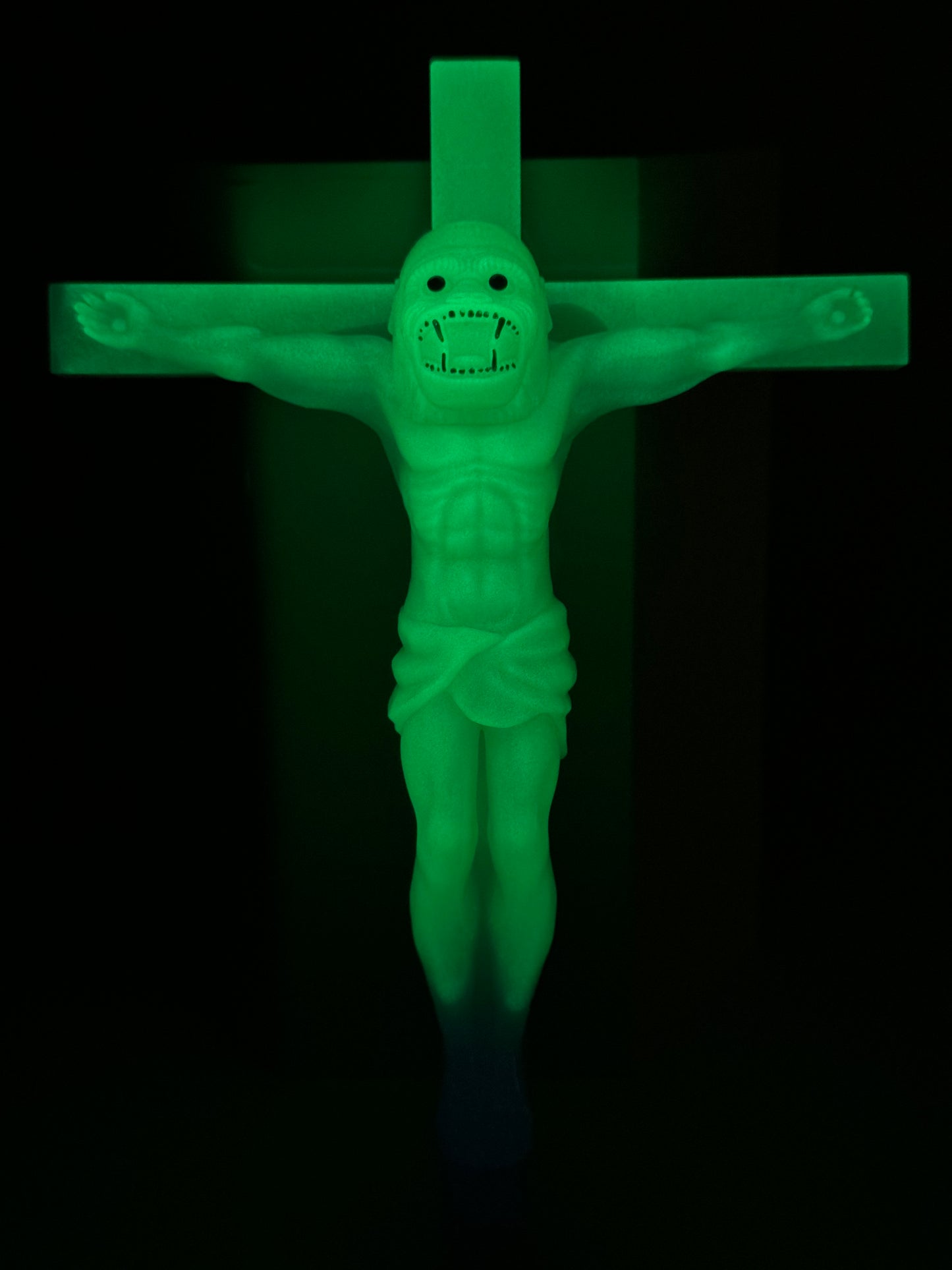 Christ on the Cross but he is an Ape, Magical Toy: A Welcome Stranger