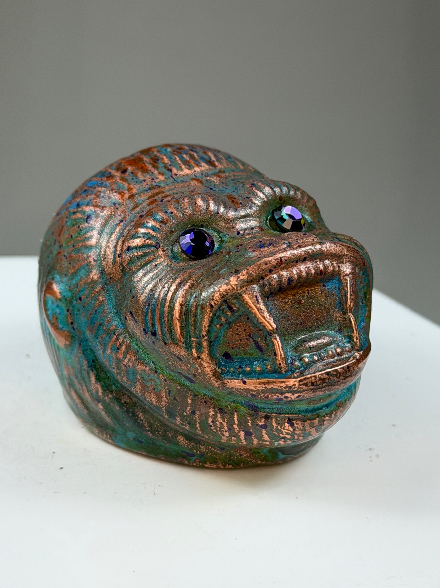 Ape Head: Copper Plated Purple Eyes