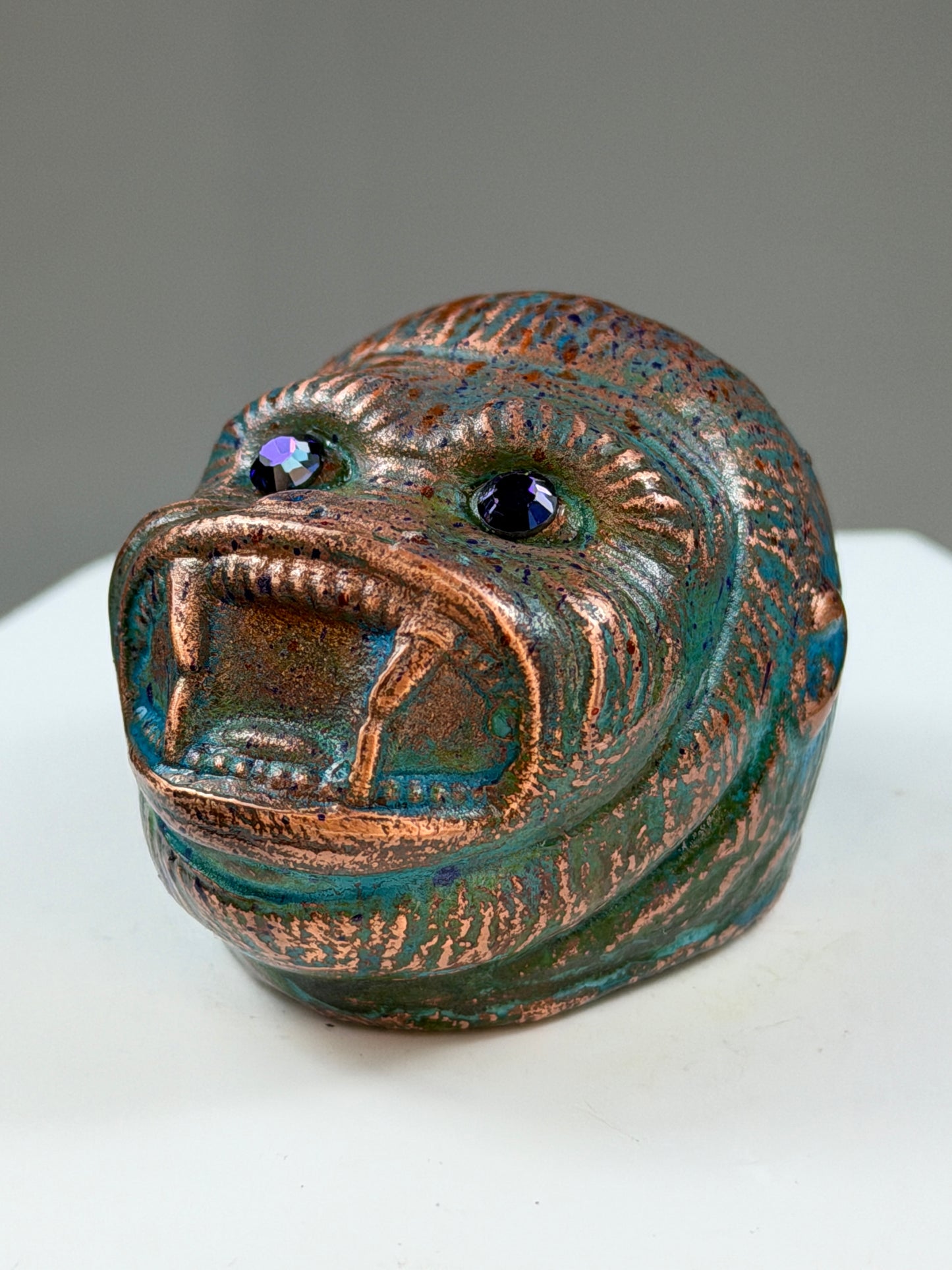 Ape Head: Copper Plated Purple Eyes