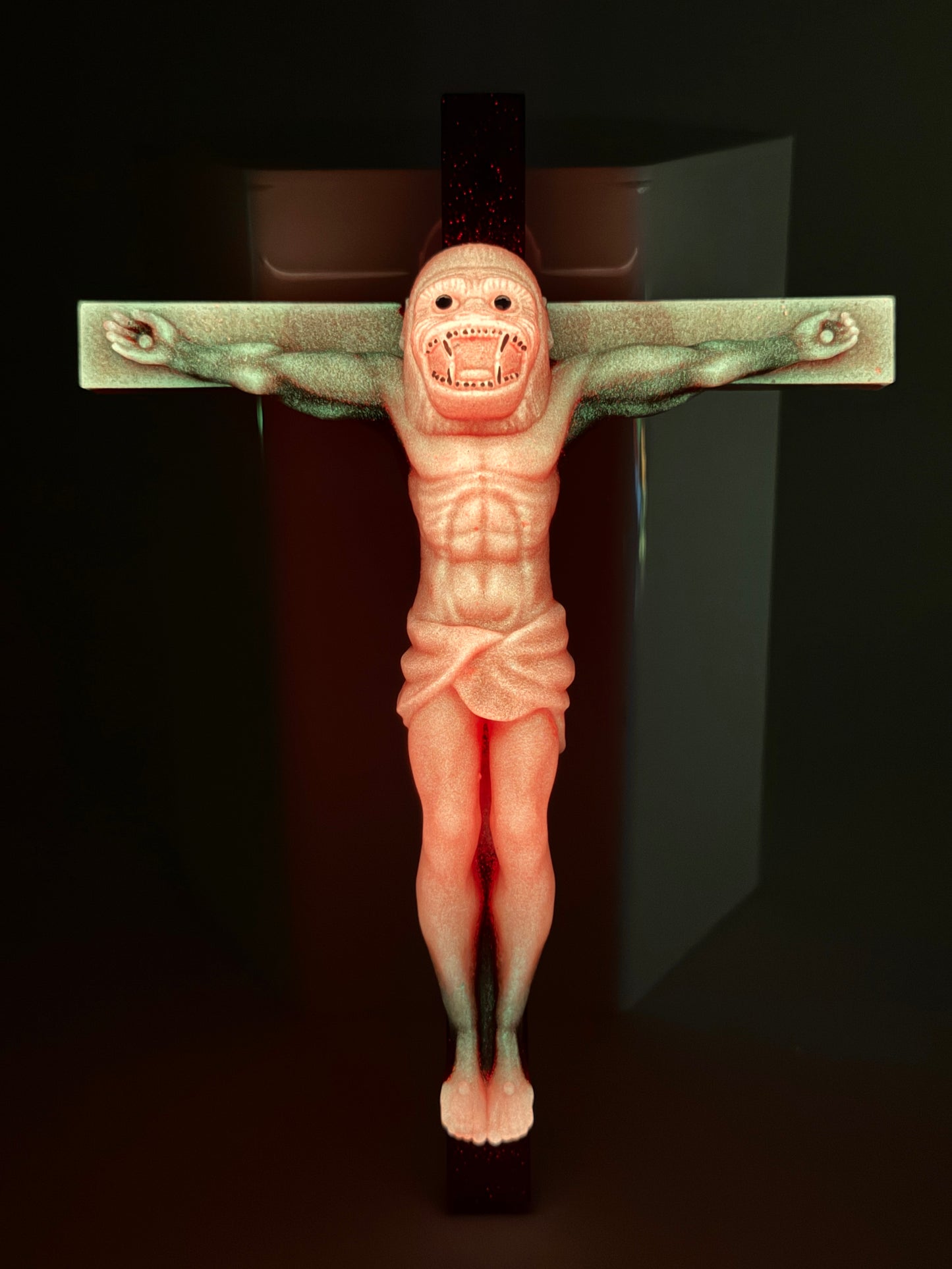 Christ on the Cross but he is an Ape, Magical Toy: A Murder Most Revered
