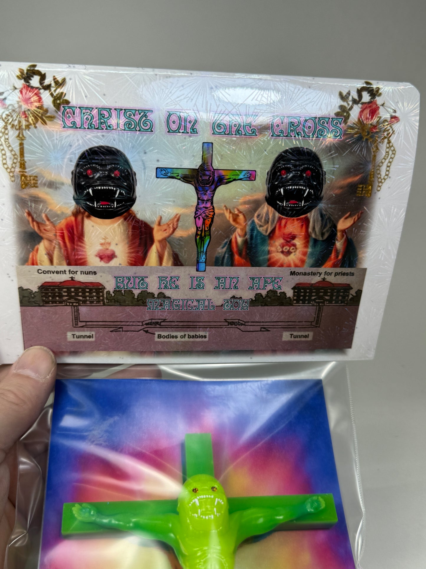 Christ on the Cross but he is an Ape, Magical Toy: Joy to You, Blessings from Space