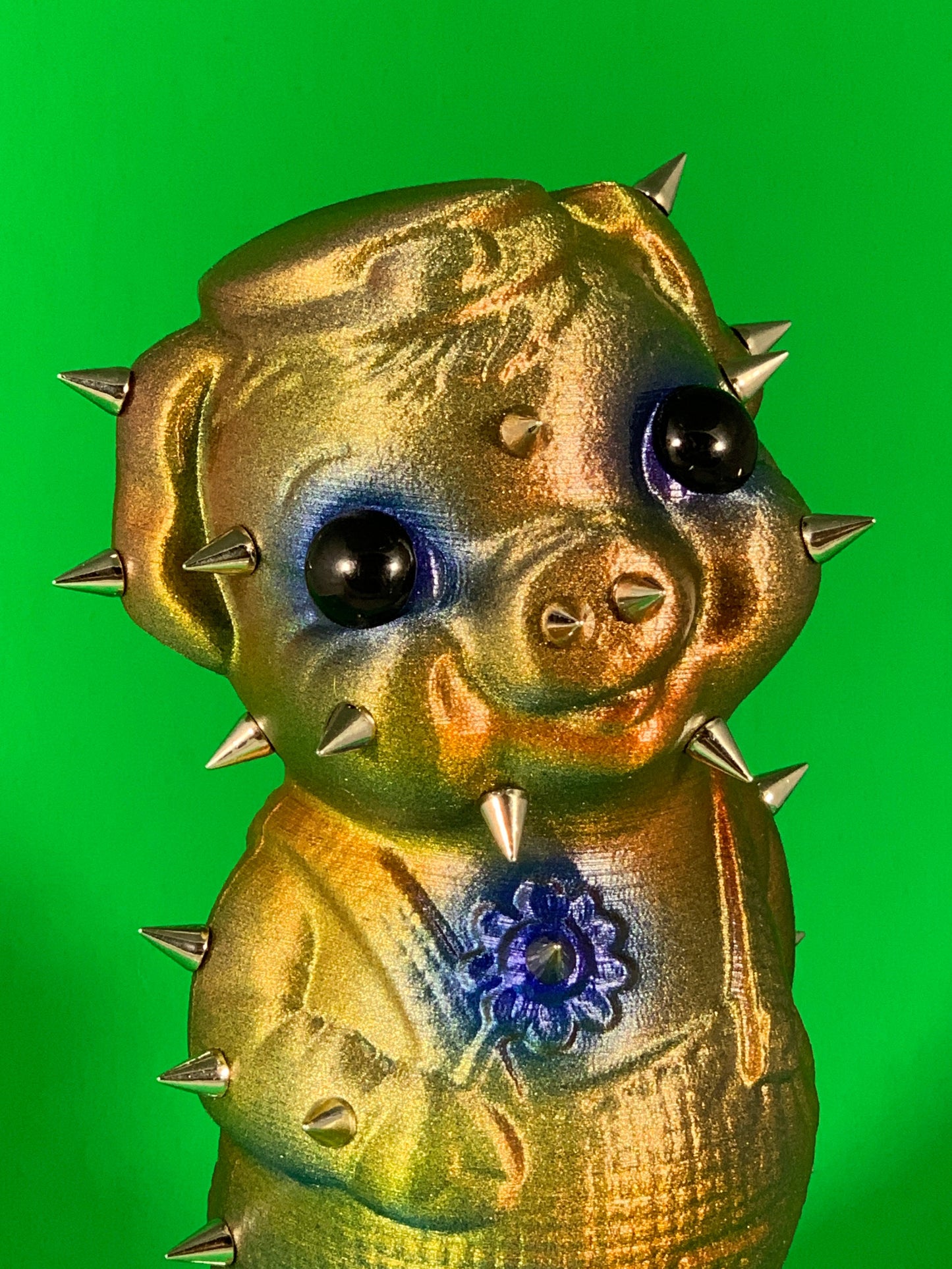 Iridescent Pig with Spikes and Big, Black Eyes  