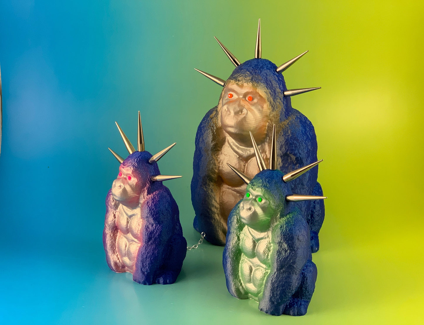 Sitting Apes: Blue Glitter and Silver Fluorescents  