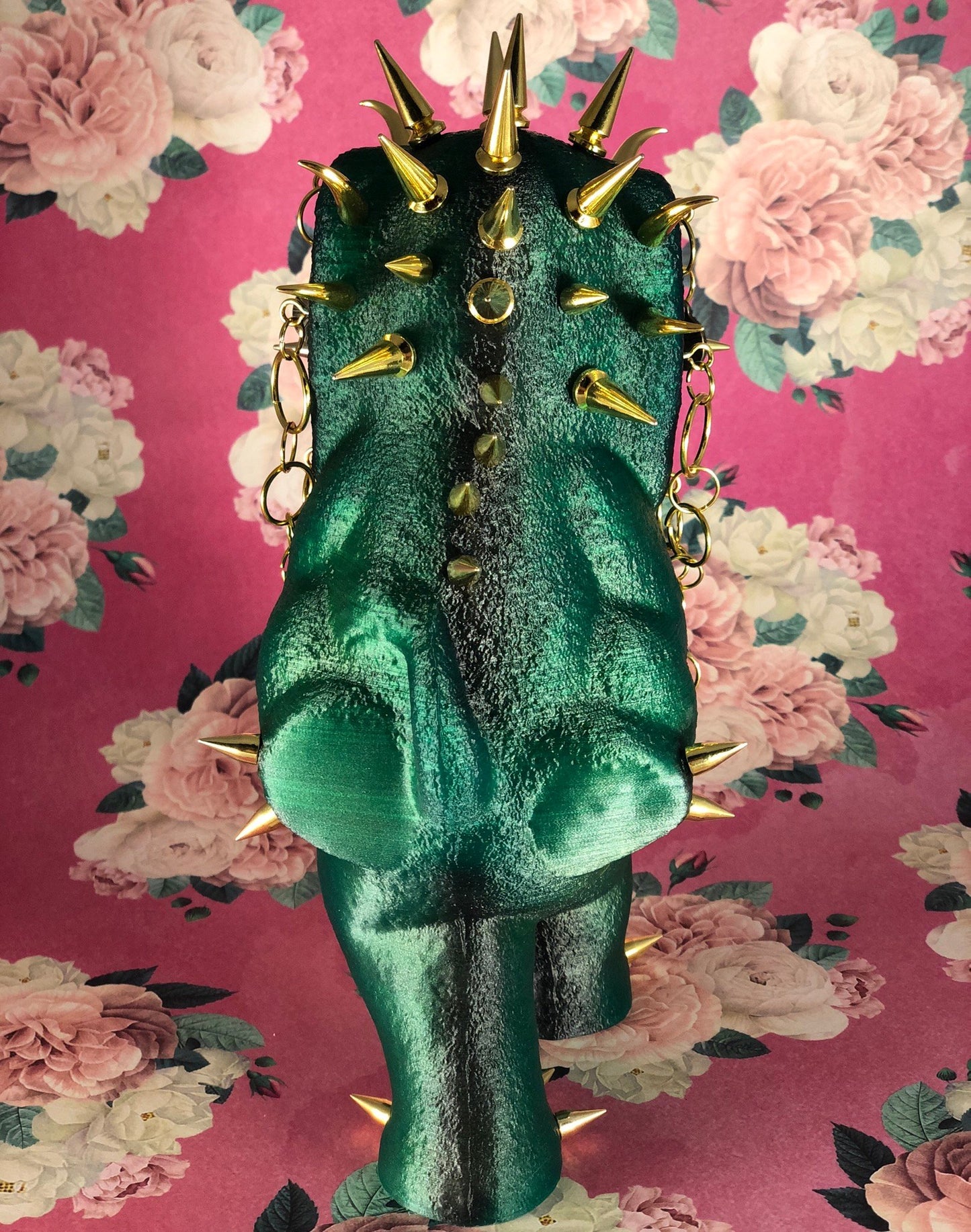 Waking Elephant: Translucent Green with Black. Gold Spikes and Such