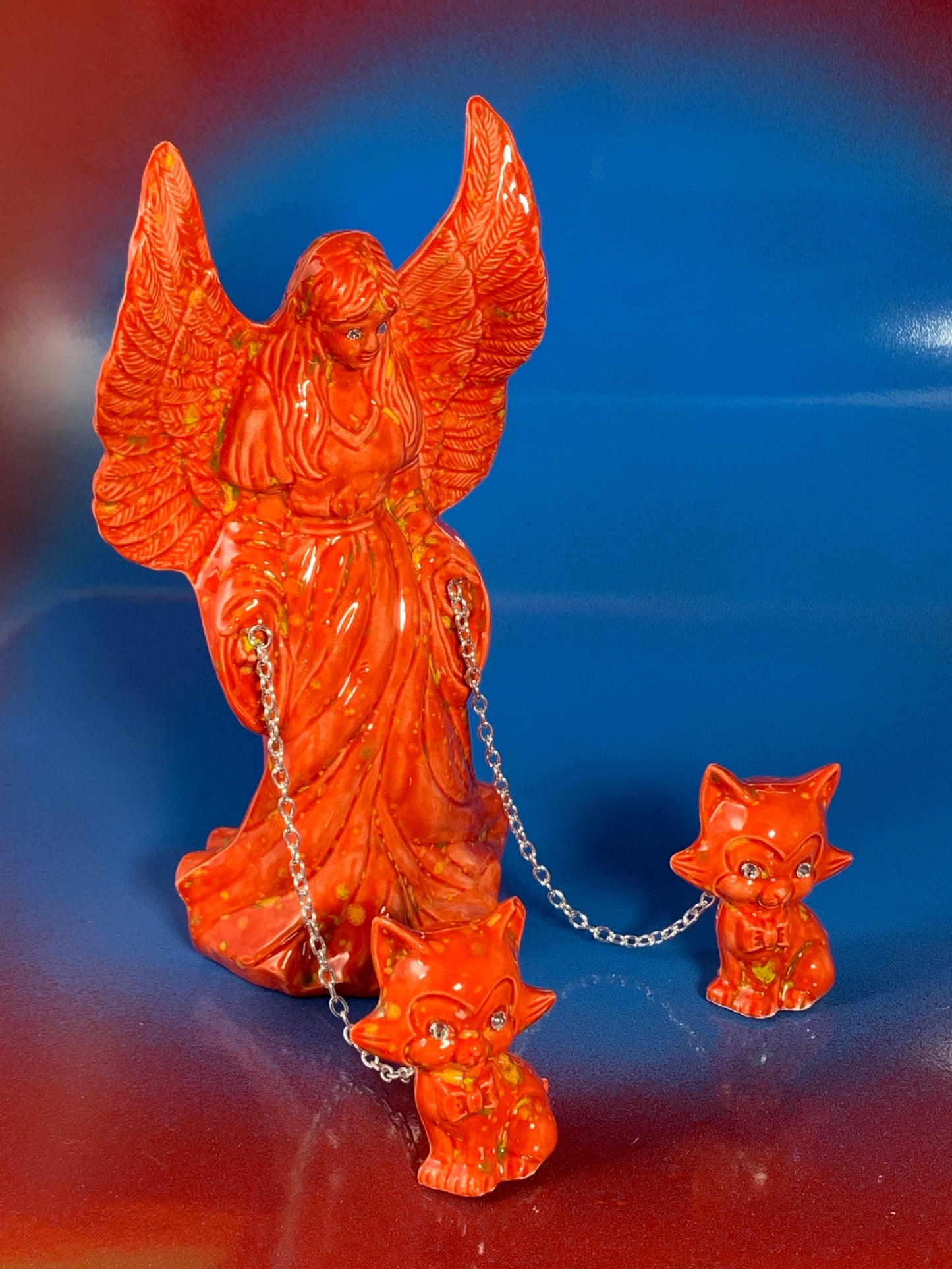Angel Chained to Cats