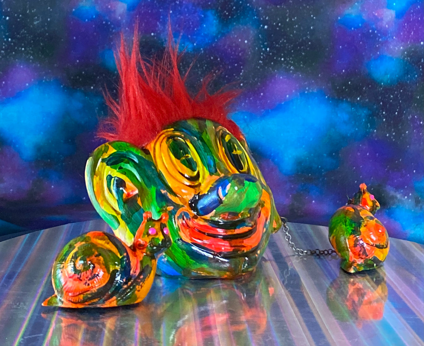 Red Hair Clown Chained to Two Snails