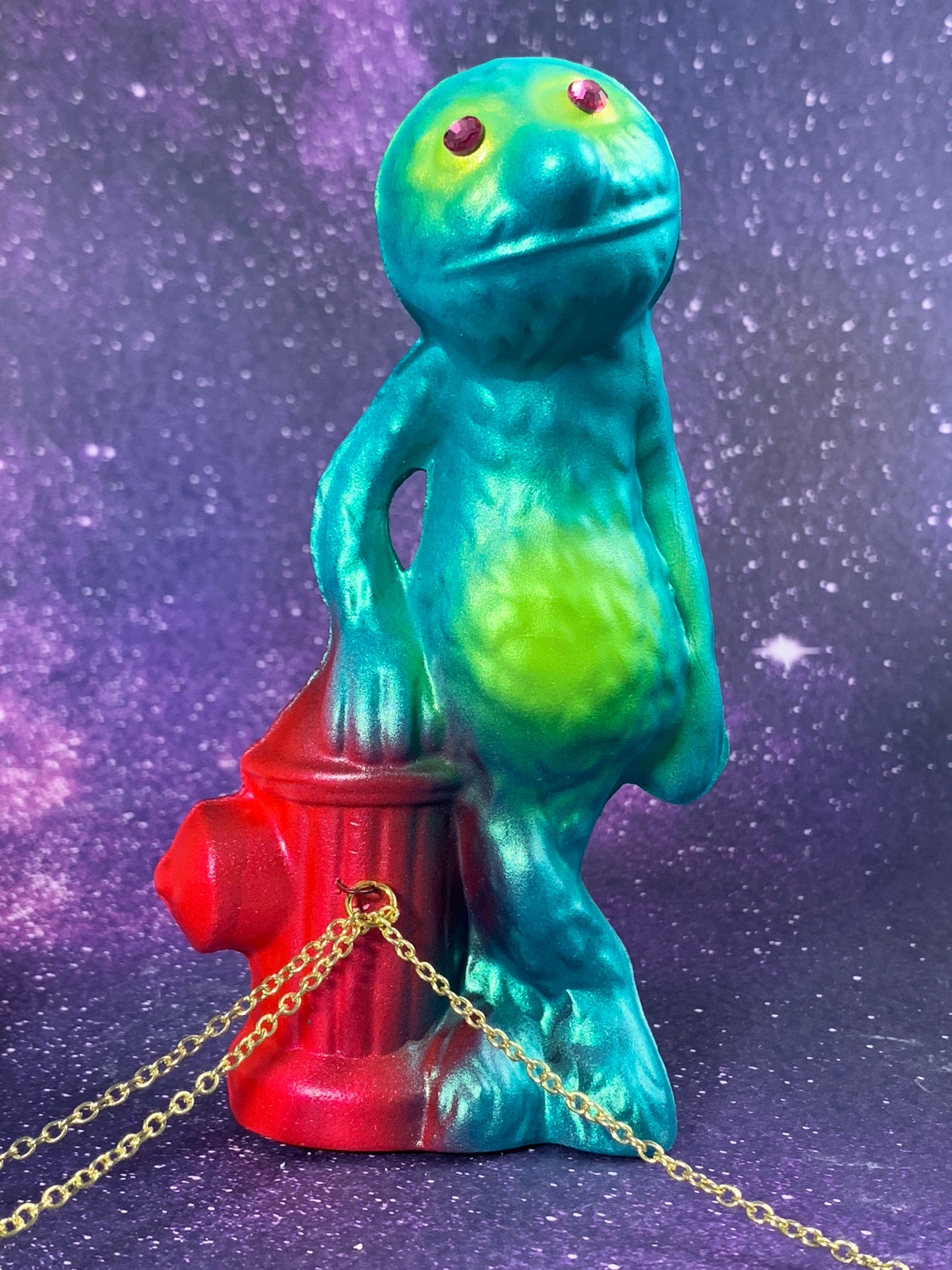 Grover Leaning on a Fire Hydrant Chained to Sports Turtles