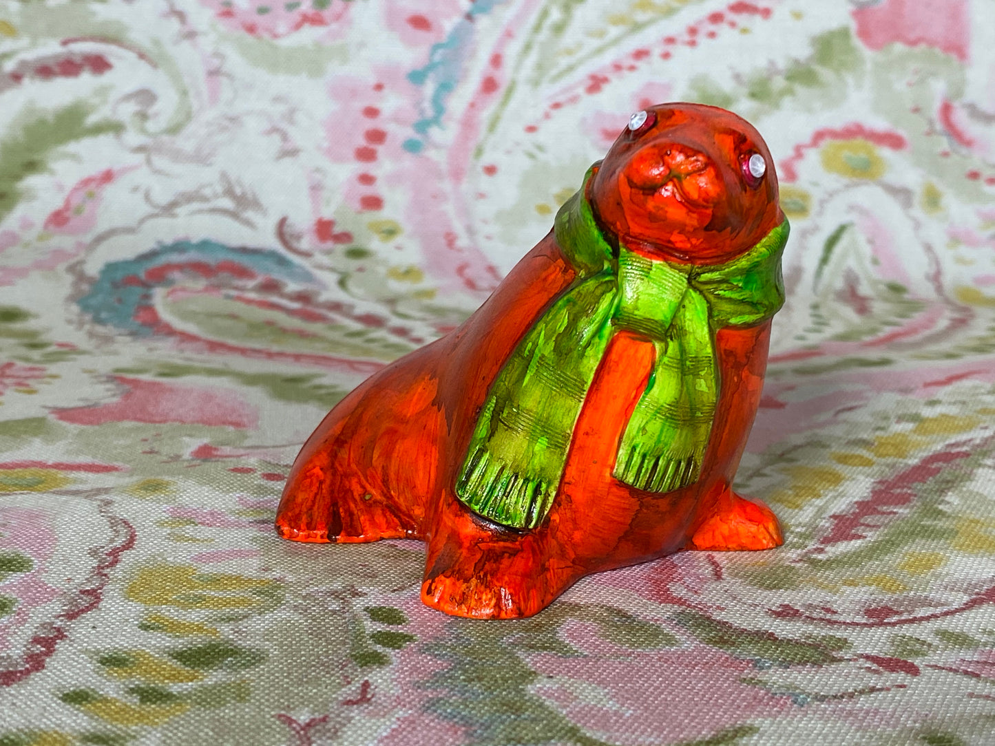 Orange Seal with Green Scarf