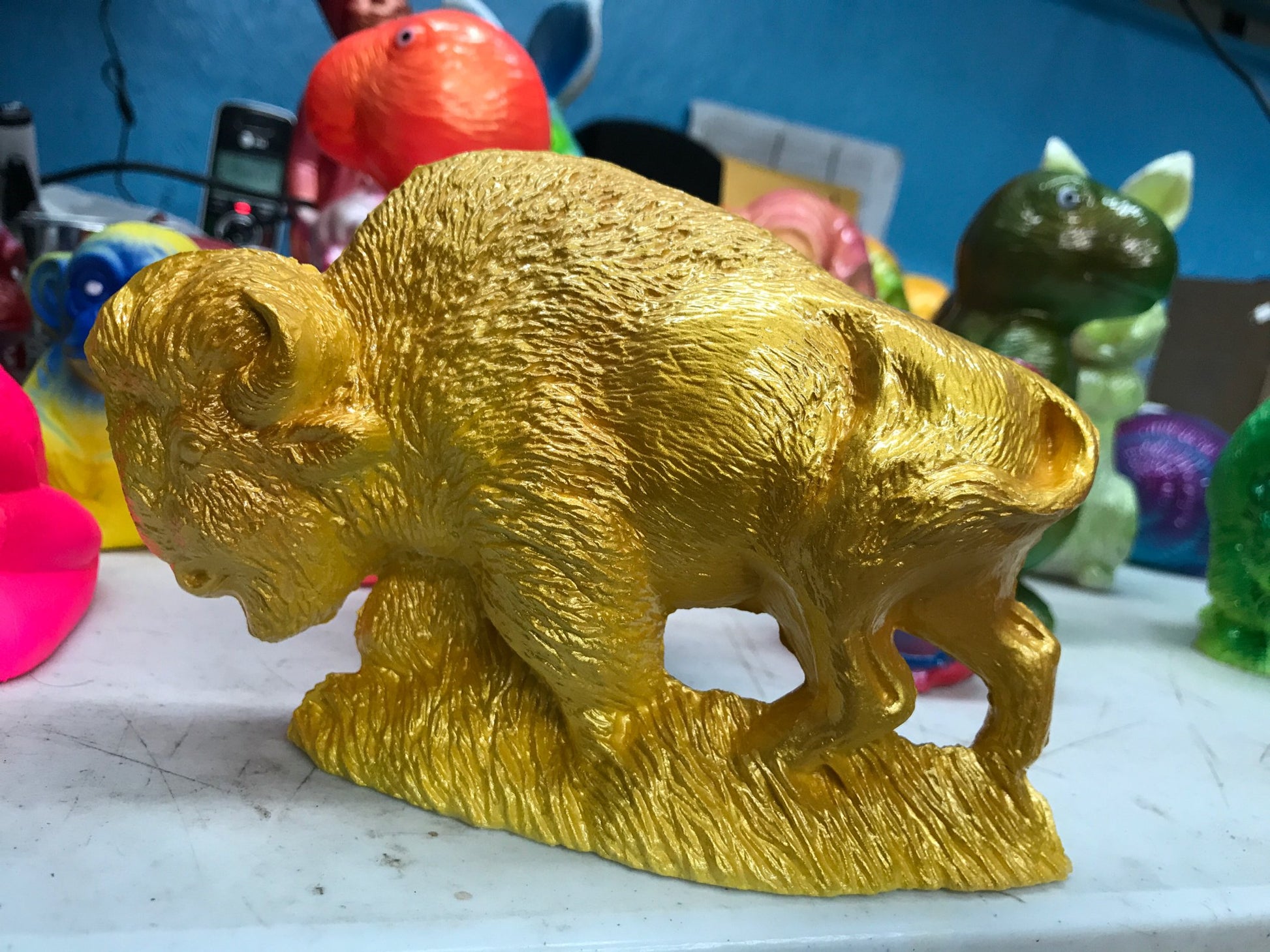 Seriously reflective bison, yellow and gold