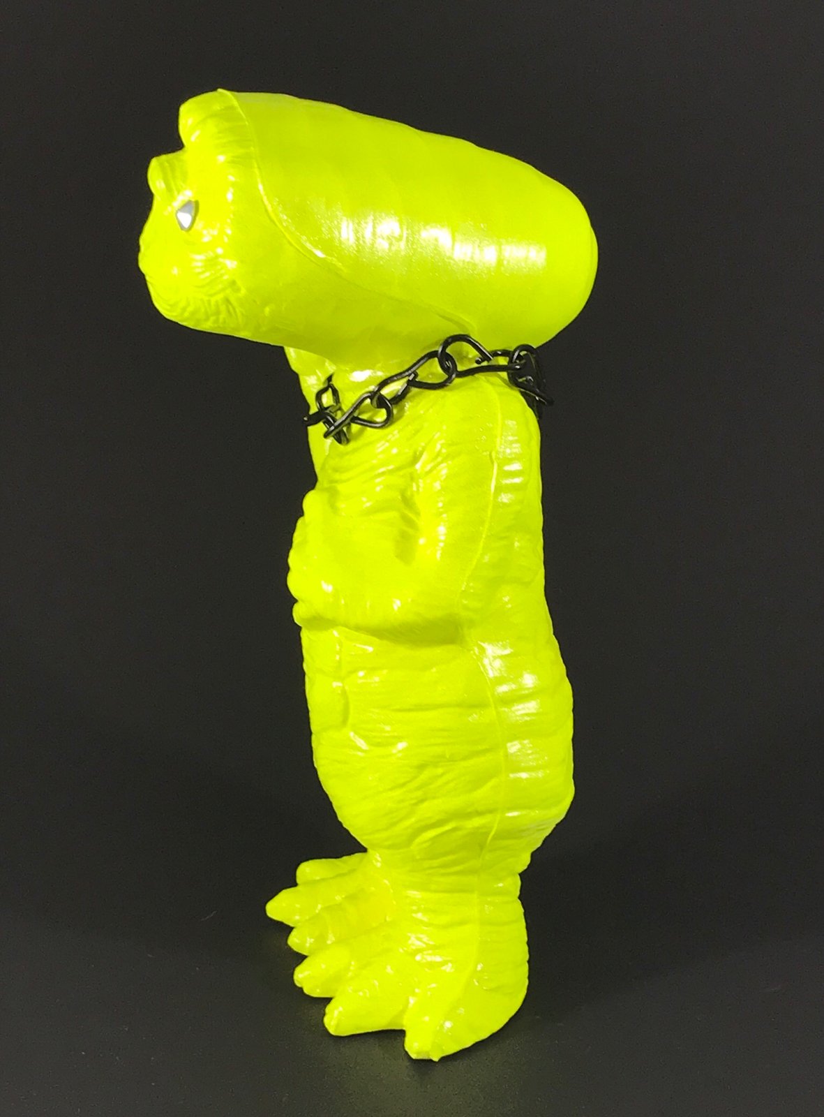 Florescent yellow ET with rhinestone eyes, black chain and metal flake