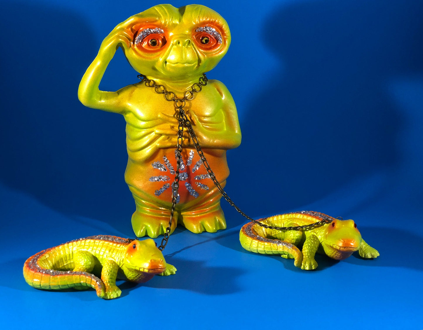 Stomachache and headache ET with crocodiles: Yellow and orange with glitter and chains