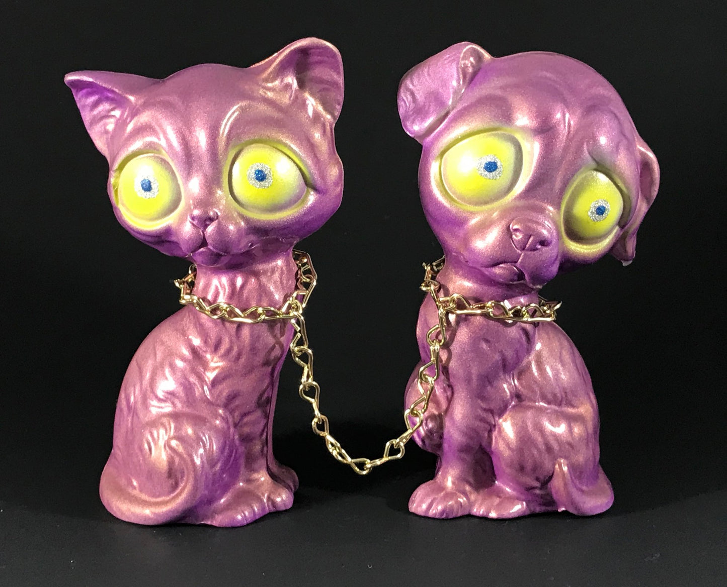 Chained sad dog and sad cat, iridescent purple/gold with metal flake/glitter eyes