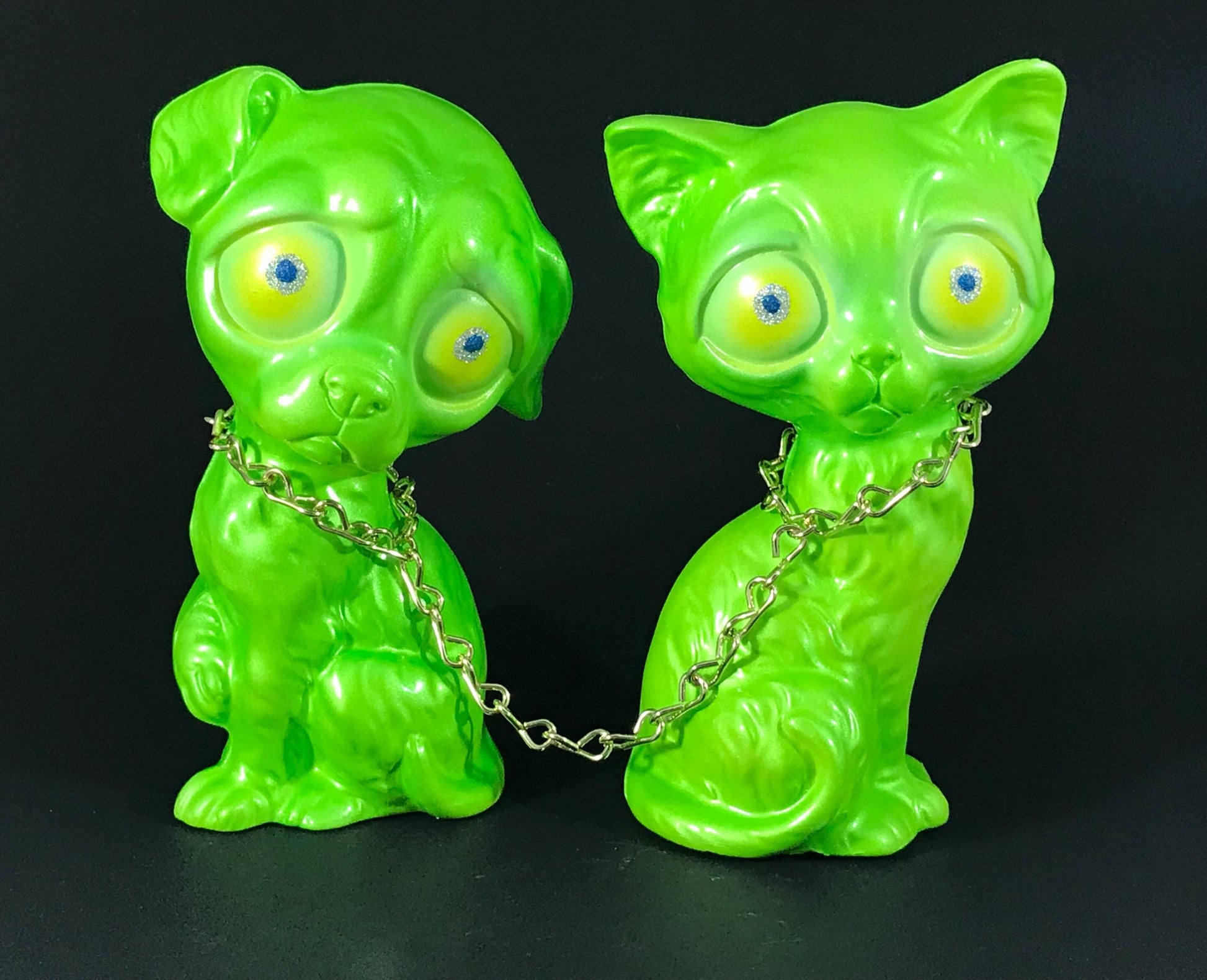 Chained sad dog and sad cat, iridescent green with metal flake/glitter eyes